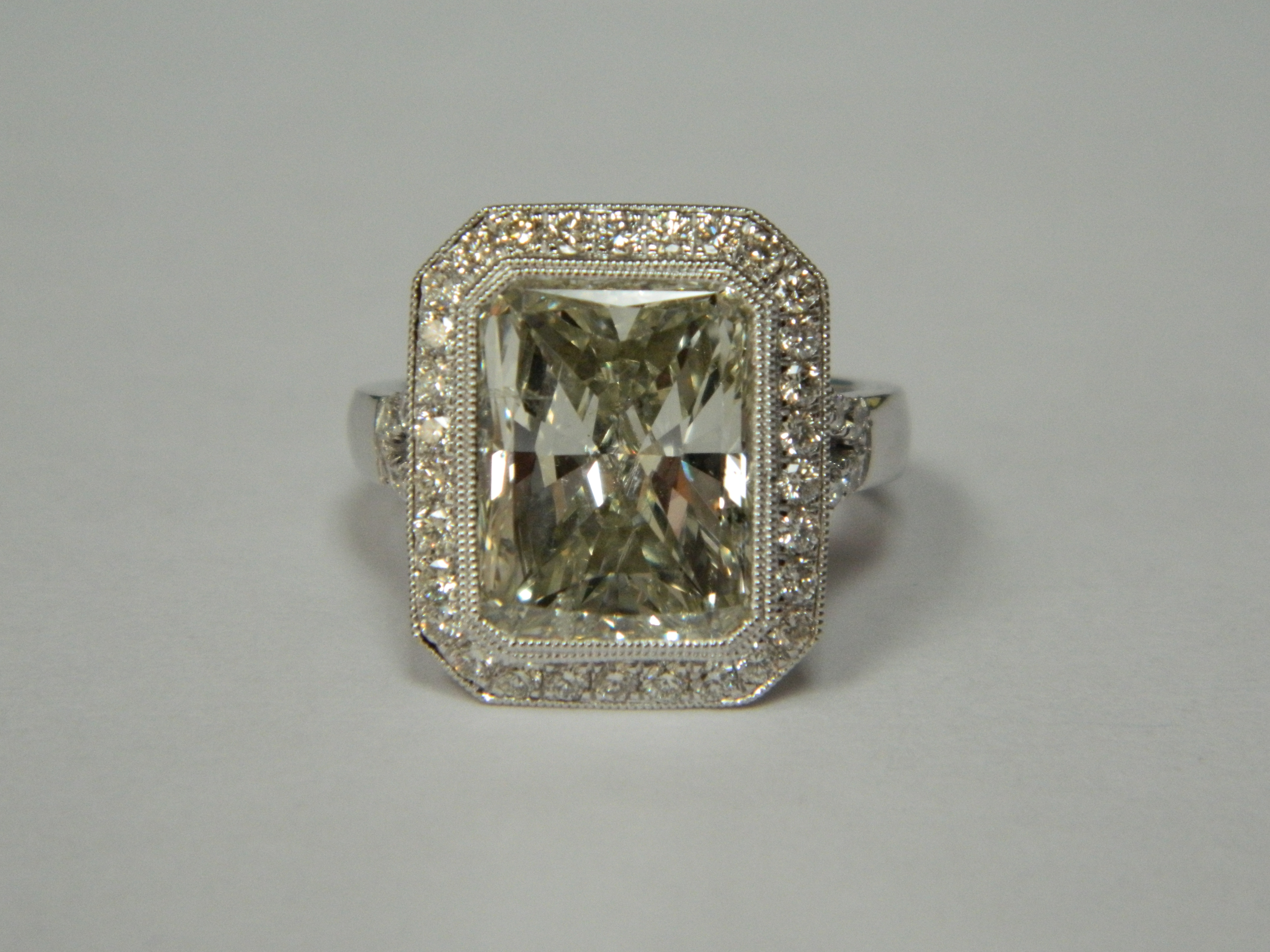 Rings Platinum Component: Center Diamond 7.02 RC, side stones 0.62ct.